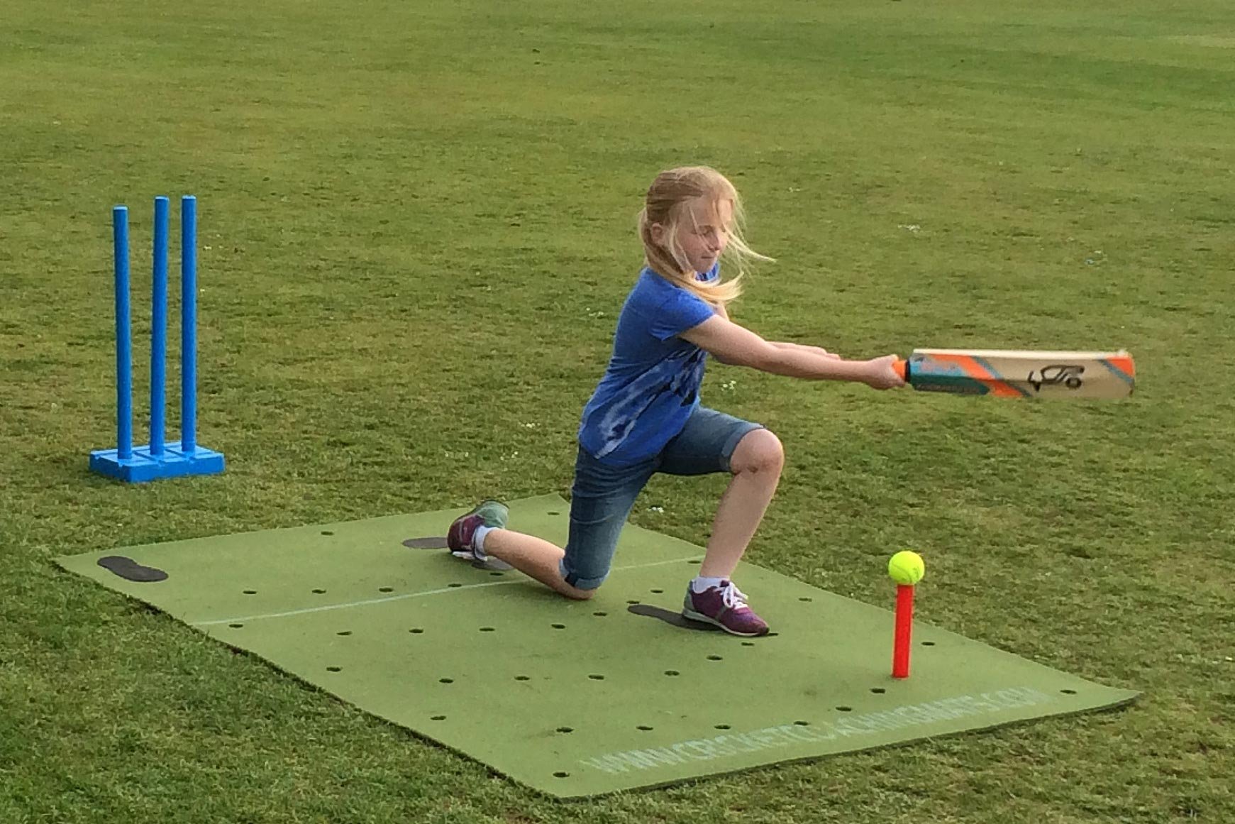 coach. Practice cricket in the garden with the cricket training, practice coaching mat